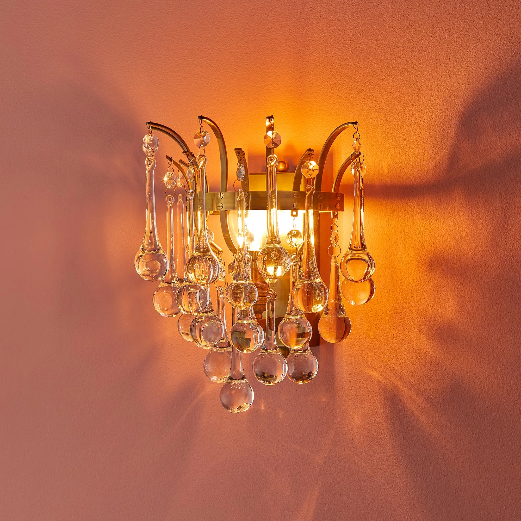 Capulet wall light in brass and glass