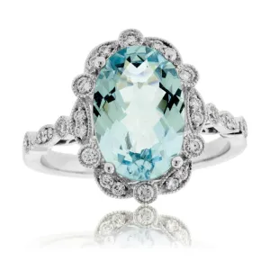 Oval-Cut Aquamarine with Scalloped Diamond Halo Ring