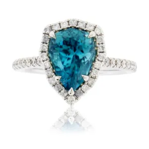 Pear-Shaped Blue Zircon & Diamond Halo Ring