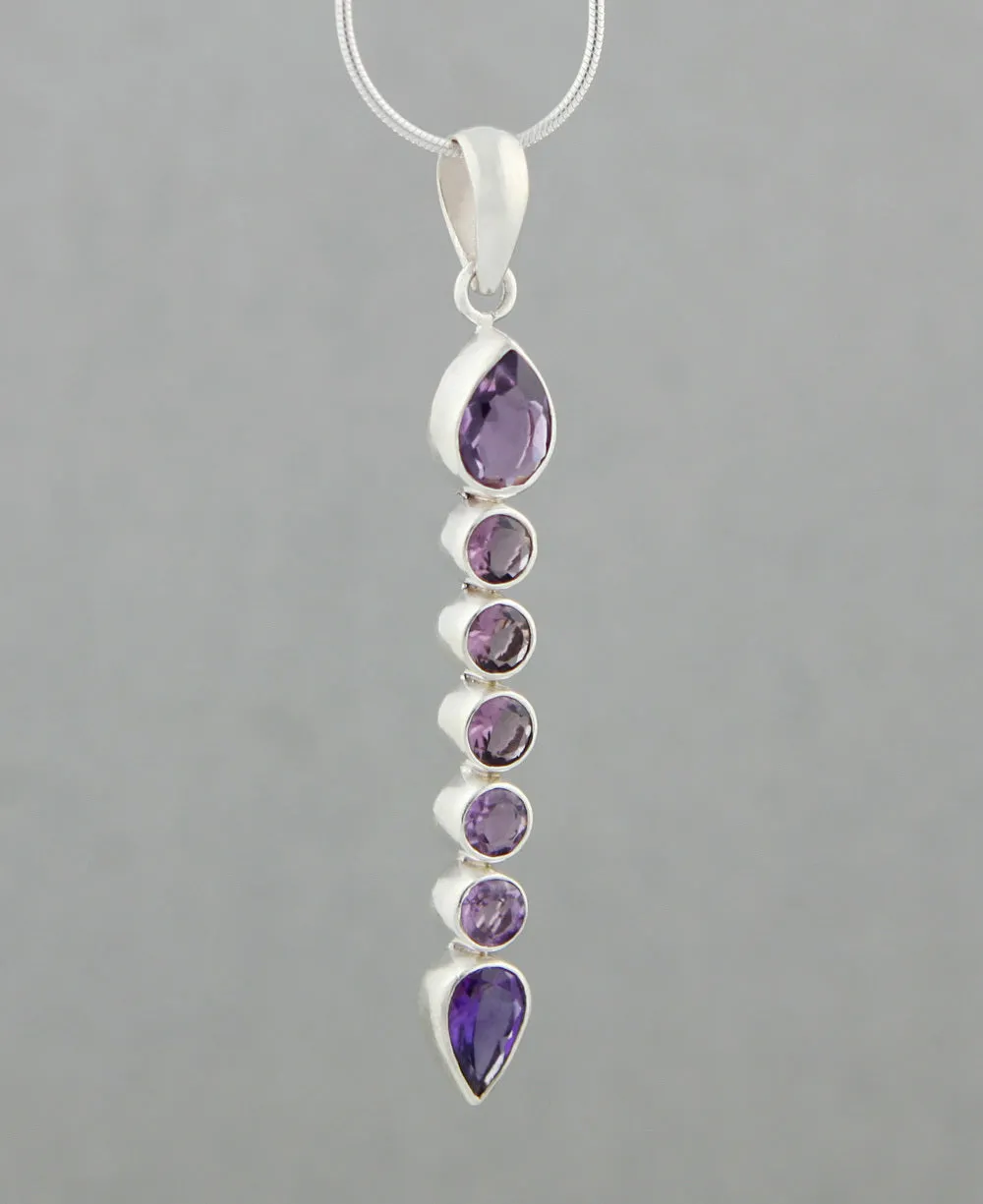 Seven Stone Elegant Amethyst Pendant